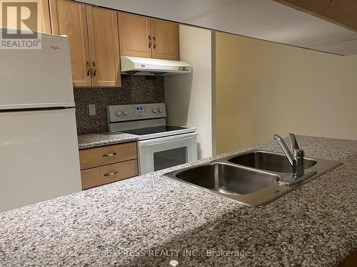 922 - 168 Simcoe Street, Toronto, ON - Indoor Photo Showing Kitchen With Double Sink