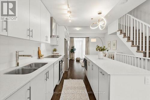 5 - 205 Bonis Avenue, Toronto, ON - Indoor Photo Showing Kitchen With Double Sink With Upgraded Kitchen