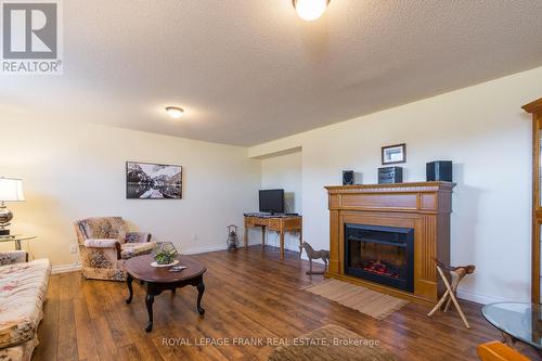 115 Haynes Road, Cramahe (Castleton), ON - Indoor Photo Showing Living Room With Fireplace