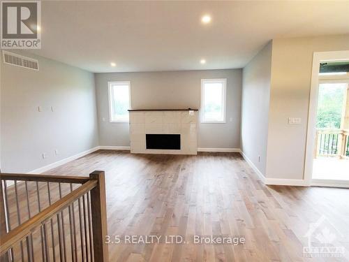 866 Rideau River Road, Merrickville-Wolford, ON - Indoor Photo Showing Living Room With Fireplace