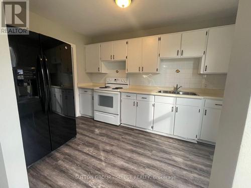 14 St Charles Street, Huron East (Vanastra), ON - Indoor Photo Showing Kitchen With Double Sink