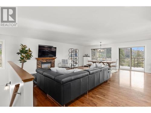 1137 Long Ridge Drive, Kelowna, BC - Indoor Photo Showing Living Room With Fireplace