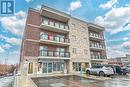 203 - 310 Broadway Avenue, Orangeville, ON  - Outdoor With Balcony With Facade 