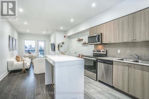 203 - 310 Broadway Avenue, Orangeville, ON - Indoor Photo Showing Kitchen With Double Sink