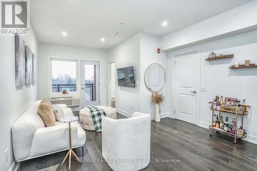 203 - 310 Broadway Avenue, Orangeville, ON - Indoor Photo Showing Living Room