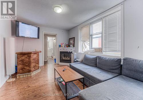 22 Ezra Avenue, Waterloo, ON - Indoor Photo Showing Living Room With Fireplace