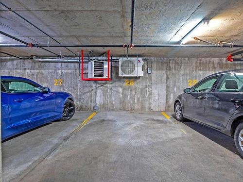 Garage - 308-750 Rue Du Docteur-Chevrier, Saint-Lambert, QC - Indoor Photo Showing Garage