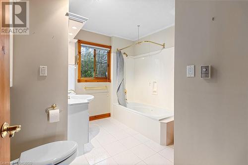 4pc main floor bathroom with soaker tub & shower. - 92 Moore St, Lion'S Head, ON - Indoor Photo Showing Bathroom