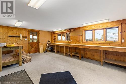 Large 20' x 13'9"" workshop w/water view, double door entry from home & outside entry. Easily convert to 4th bedroom or a separate professional home office space. - 92 Moore St, Lion'S Head, ON - Indoor Photo Showing Other Room