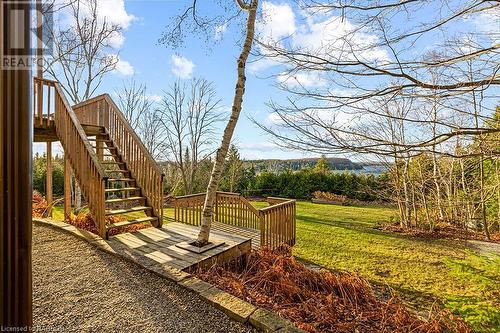 Multi-tiered custom wooden decking. - 92 Moore St, Lion'S Head, ON - Outdoor