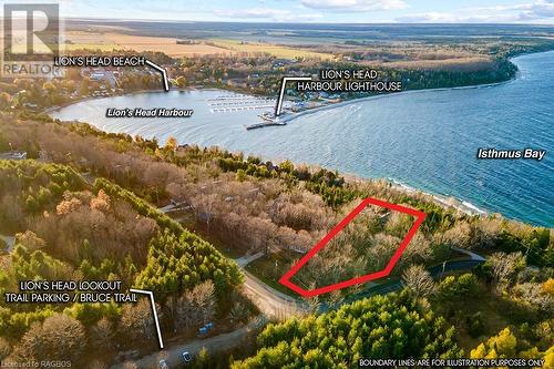 Offering panoramic views of the Harbour, White Bluff Niagara Escarpment and open water Georgian Bay. - 92 Moore St, Lion'S Head, ON - Outdoor With Body Of Water With View