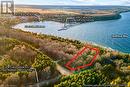 Offering panoramic views of the Harbour, White Bluff Niagara Escarpment and open water Georgian Bay. - 92 Moore St, Lion'S Head, ON  - Outdoor With Body Of Water With View 