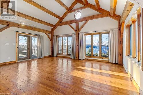 GREAT ROOM has expansive windows and walk out to the elevated terrace. - 92 Moore St, Lion'S Head, ON - Indoor Photo Showing Other Room