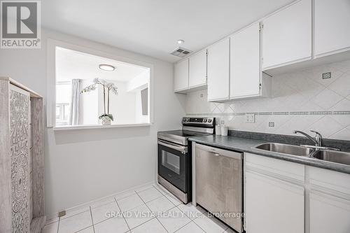 905 - 10 Dean Park Road, Toronto, ON - Indoor Photo Showing Kitchen With Double Sink