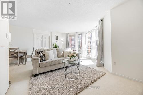 905 - 10 Dean Park Road, Toronto, ON - Indoor Photo Showing Living Room