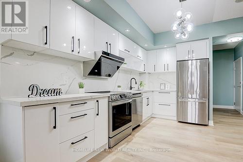 A305 - 89 South Town Centre Boulevard, Markham, ON - Indoor Photo Showing Kitchen With Stainless Steel Kitchen With Upgraded Kitchen