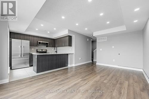 07 - 100 Dufay Road, Brampton, ON - Indoor Photo Showing Kitchen