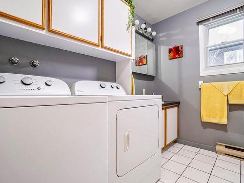 Salle de lavage - 5678 Rue Alexandre, Brossard, QC - Indoor Photo Showing Laundry Room