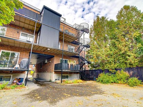 Back facade - 3966 Rue Gertrude, Montréal (Verdun/Île-Des-Soeurs), QC - Outdoor With Balcony