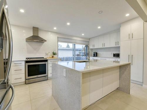 Cuisine - 511 Rue Gervais, Laval (Sainte-Dorothée), QC - Indoor Photo Showing Kitchen With Upgraded Kitchen