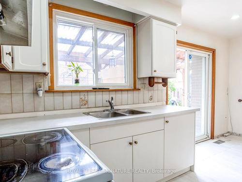 3956 Brandon Gate Dr N, Mississauga, ON - Indoor Photo Showing Kitchen With Double Sink