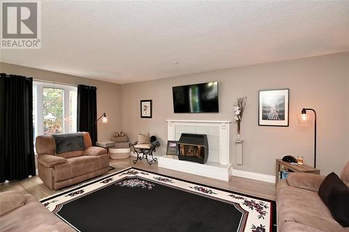 1640 Murphy Road, Sarnia, ON - Indoor Photo Showing Living Room With Fireplace