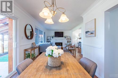 2337 Passingham Drive, Sarnia, ON - Indoor Photo Showing Dining Room With Fireplace