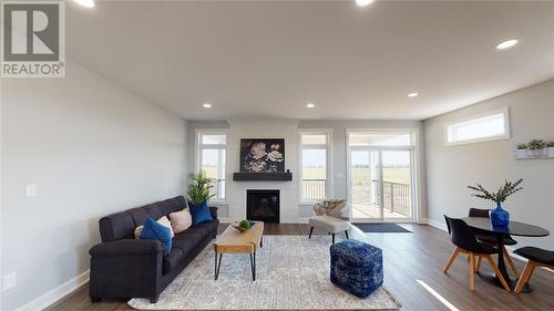 640 Ketter Way, Plympton-Wyoming, ON - Indoor Photo Showing Living Room With Fireplace