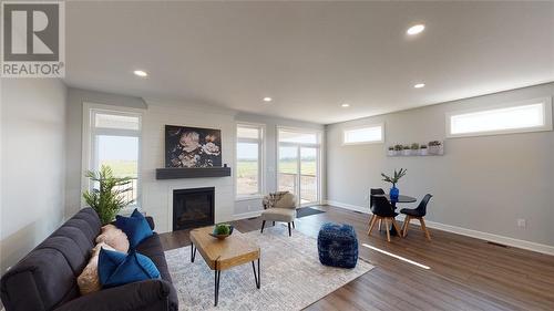 640 Ketter Way, Plympton-Wyoming, ON - Indoor Photo Showing Living Room With Fireplace