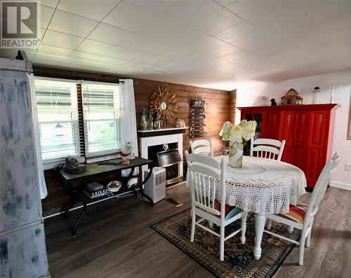 1940 London Line Unit# 4, Sarnia, ON - Indoor Photo Showing Dining Room With Fireplace