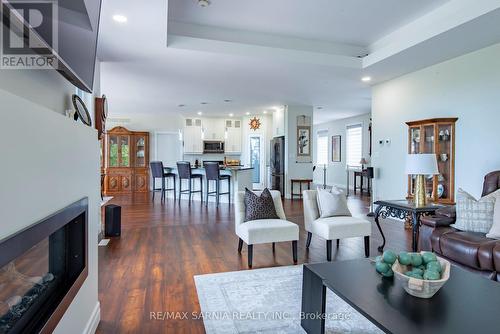 3394 Schram Drive W, Plympton-Wyoming (Plympton Wyoming), ON - Indoor Photo Showing Living Room With Fireplace