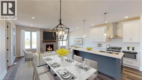 678 Ketter Way, Plympton-Wyoming, ON - Indoor Photo Showing Kitchen With Fireplace With Upgraded Kitchen