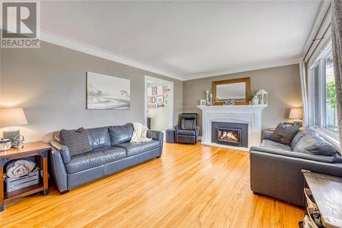 6730 O'Banwell Street, Plympton-Wyoming, ON - Indoor Photo Showing Living Room With Fireplace