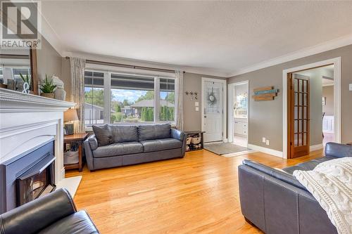 6730 O'Banwell Street, Plympton-Wyoming, ON - Indoor Photo Showing Living Room With Fireplace