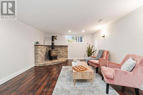 Staged Photo is from a Previous Listing - 4049 Charlie Street, Petrolia, ON - Indoor Photo Showing Living Room With Fireplace