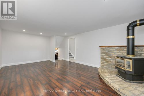 4049 Charlie Street, Petrolia, ON - Indoor Photo Showing Other Room With Fireplace