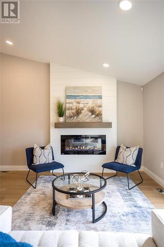 435 Queen Street Unit# 26, St Clair, ON - Indoor Photo Showing Living Room With Fireplace