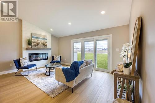 435 Queen Street Unit# 26, St Clair, ON - Indoor Photo Showing Living Room With Fireplace