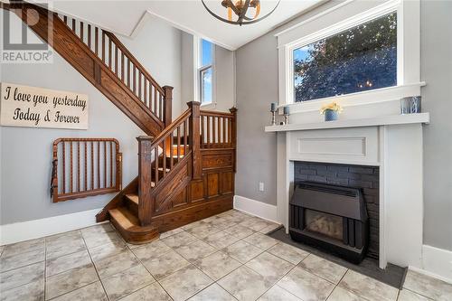 613 Broadway Street, Plympton-Wyoming, ON - Indoor Photo Showing Other Room With Fireplace