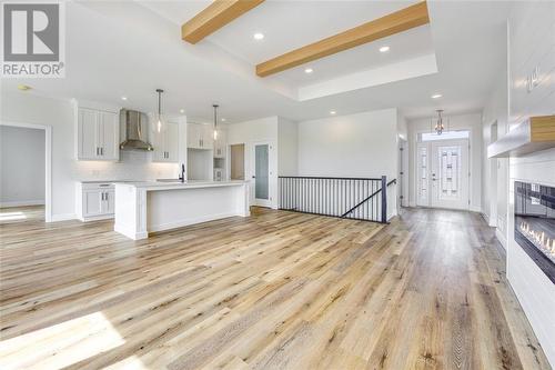 3587 Paul Crescent, Plympton-Wyoming, ON - Indoor Photo Showing Kitchen With Fireplace