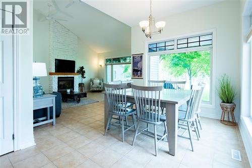 7359 Blue Point Bay Path, Plympton-Wyoming, ON - Indoor Photo Showing Dining Room With Fireplace