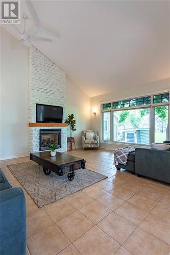 7359 Blue Point Bay Path, Plympton-Wyoming, ON - Indoor Photo Showing Living Room With Fireplace