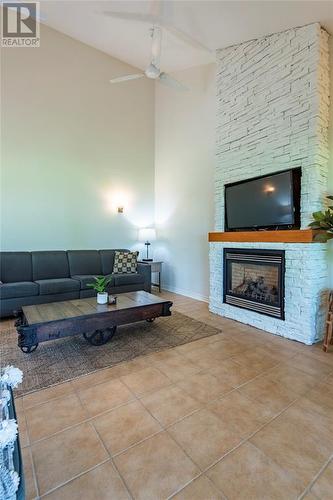 7359 Blue Point Bay Path, Plympton-Wyoming, ON - Indoor Photo Showing Living Room With Fireplace