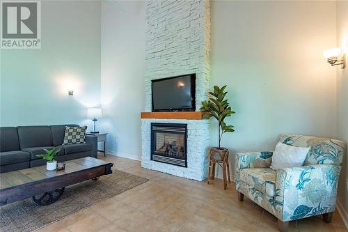 7359 Blue Point Bay Path, Plympton-Wyoming, ON - Indoor Photo Showing Living Room With Fireplace