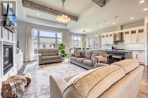 7122 Muskoka Trail, Plympton-Wyoming, ON - Indoor Photo Showing Living Room With Fireplace