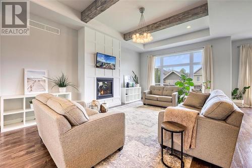 7122 Muskoka Trail, Plympton-Wyoming, ON - Indoor Photo Showing Living Room With Fireplace