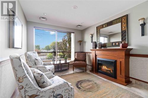 350 Front Street North Unit# 303, Sarnia, ON - Indoor Photo Showing Living Room With Fireplace