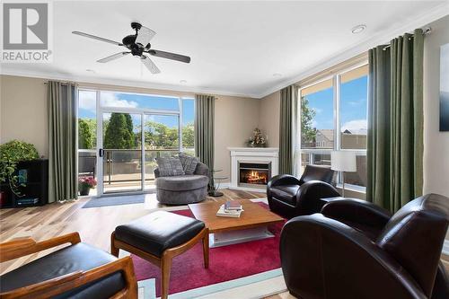 350 Front Street North Unit# 303, Sarnia, ON - Indoor Photo Showing Living Room With Fireplace