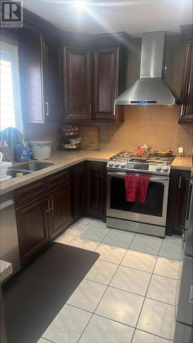 10 Pertosa Drive, Brampton, ON - Indoor Photo Showing Kitchen With Double Sink