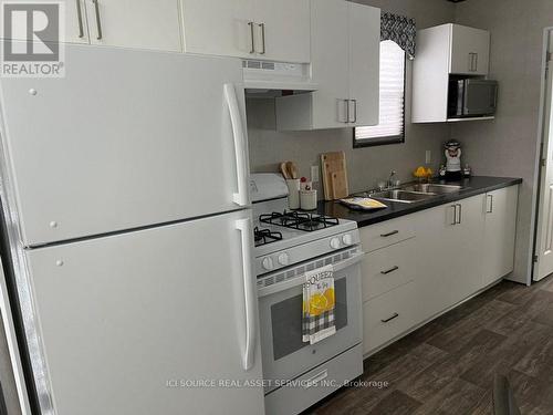 Btnb065 - 1047 Bonnie Lake Camp Road, Bracebridge, ON - Indoor Photo Showing Kitchen With Double Sink